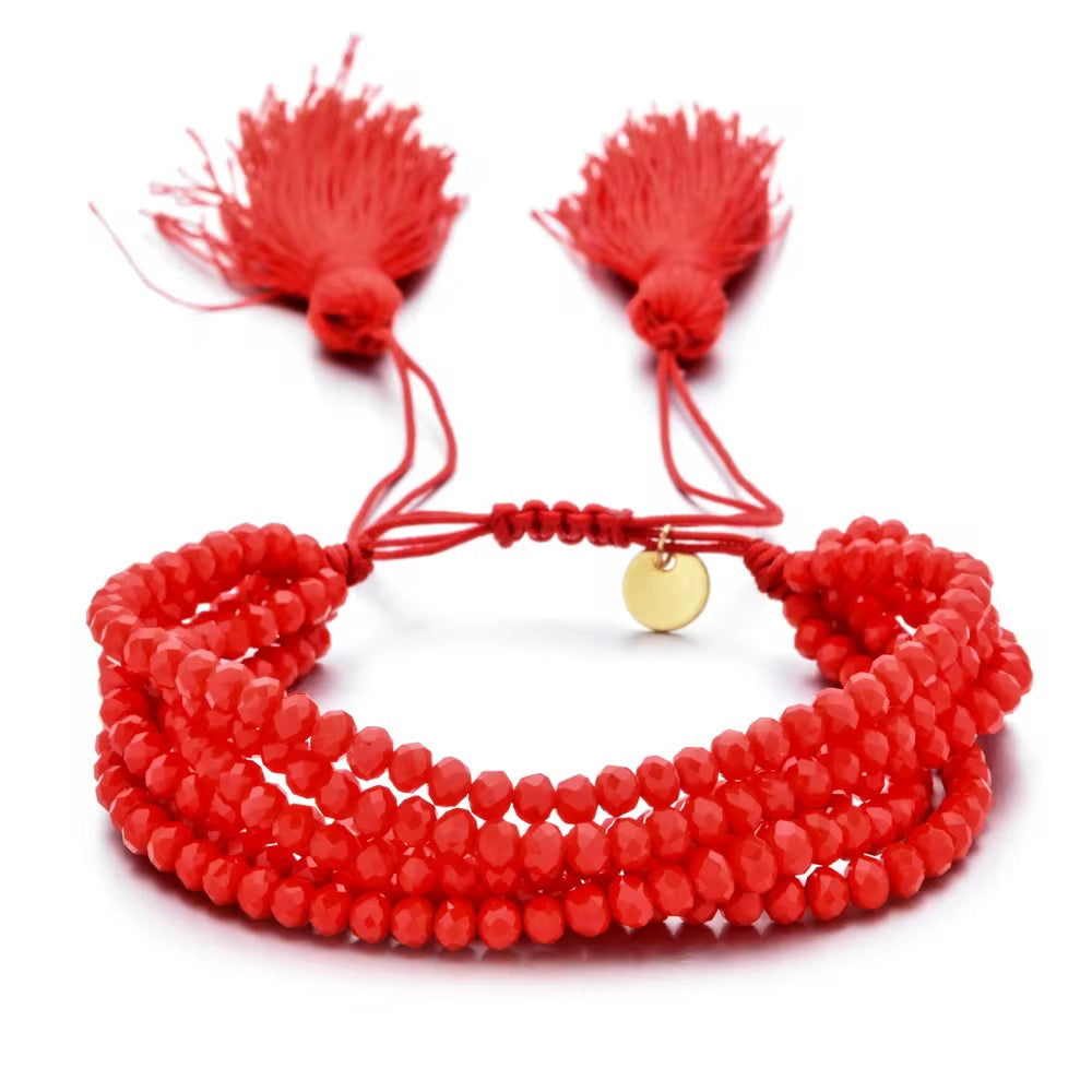 Pulsera Seis Cristales con Pompones