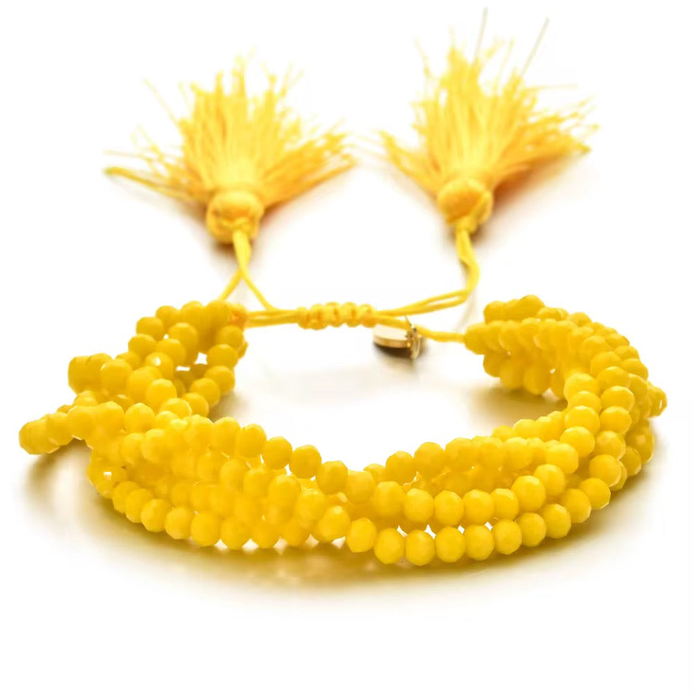 Pulsera Seis Cristales con Pompones
