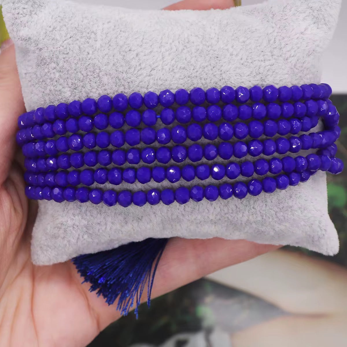 Pulsera Seis Cristales con Pompones