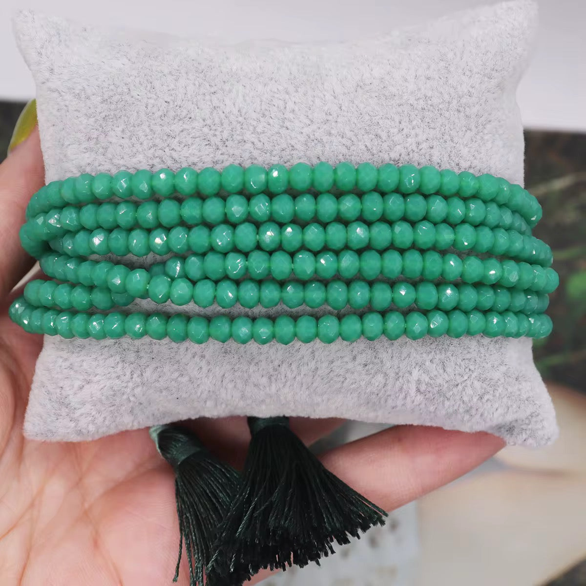 Pulsera Seis Cristales con Pompones