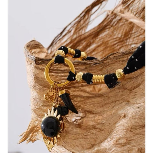 Collar Noir Mystique with Gold Accents and Polka Dot Design for Stylish Accessory